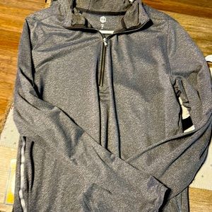 Gray running under armour shirt with reflective sides and hood
